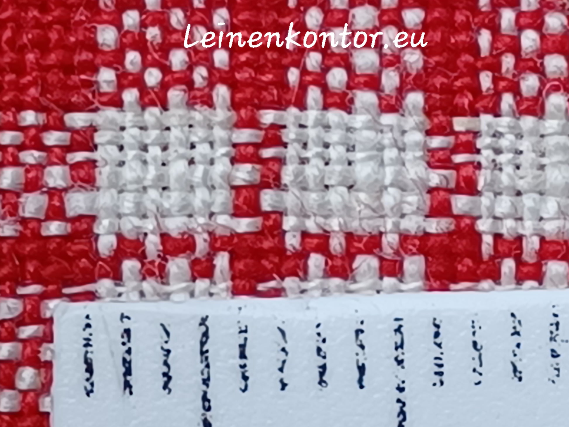 farbiges Bauernkleinen Rot-Weiß Textur mit Milllimeterskala