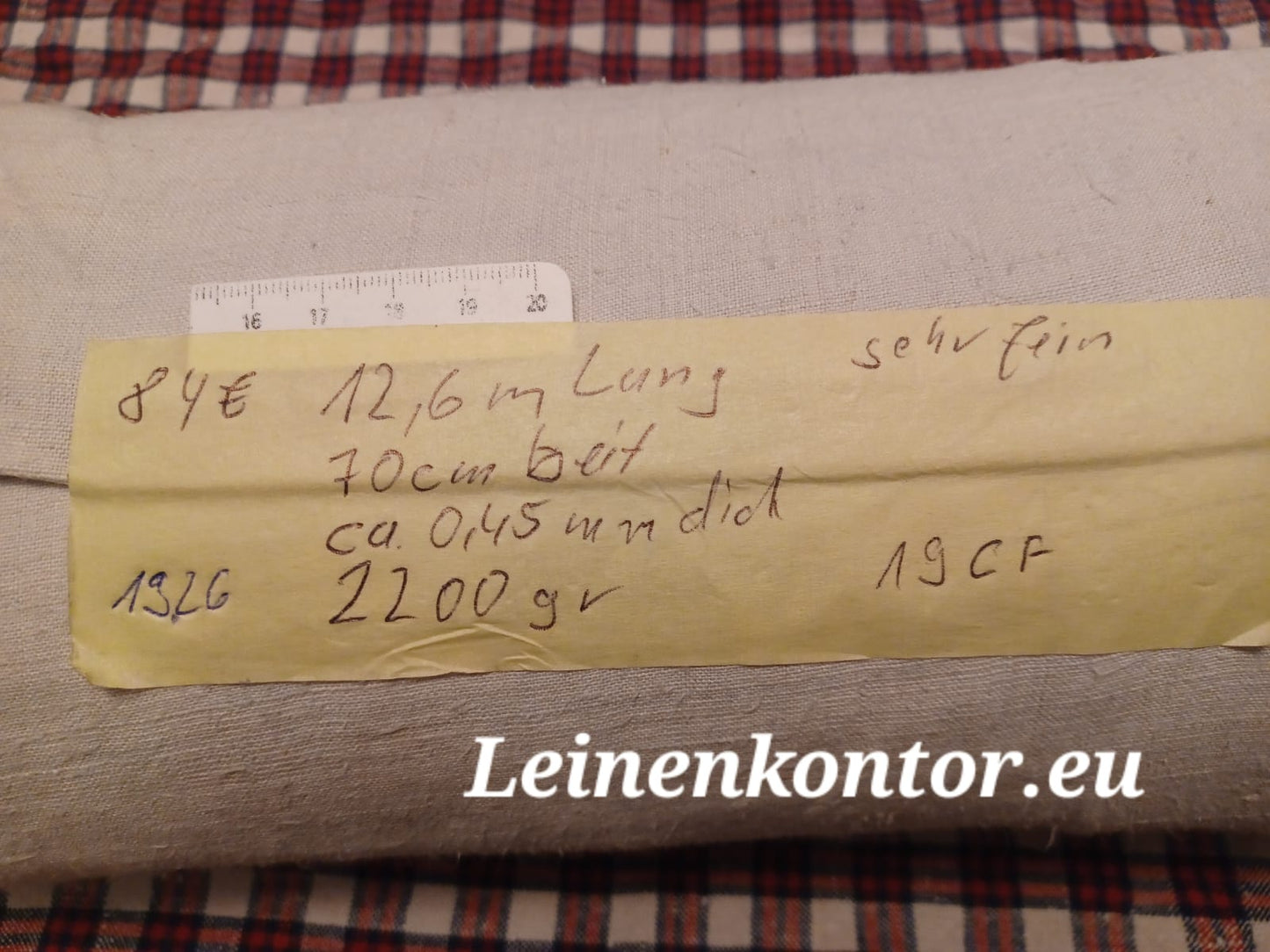 Leinenballen mit Etikett (Beschreibung)