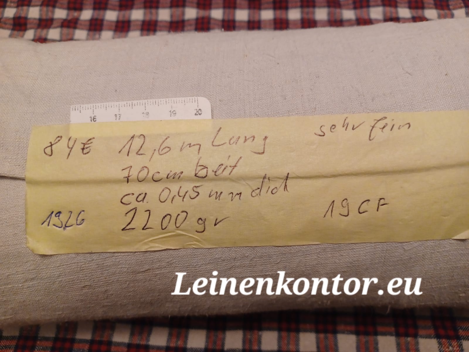 Leinenballen mit Etikett (Beschreibung)