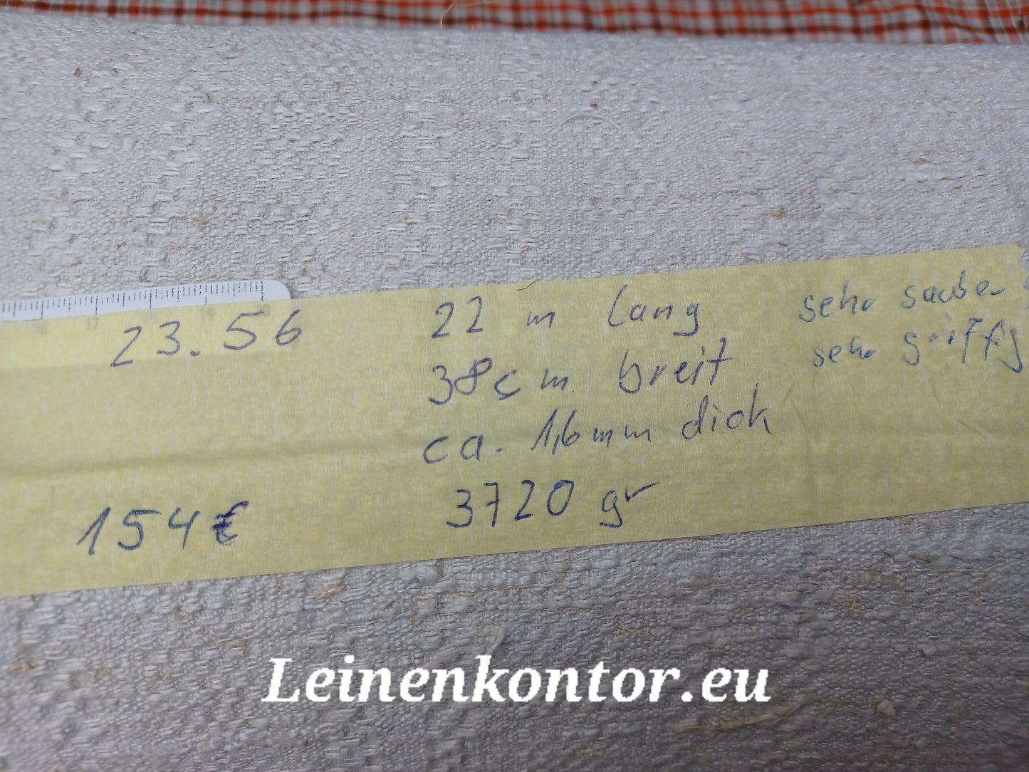 Leinenballen mit Etikett (Beschreibung)