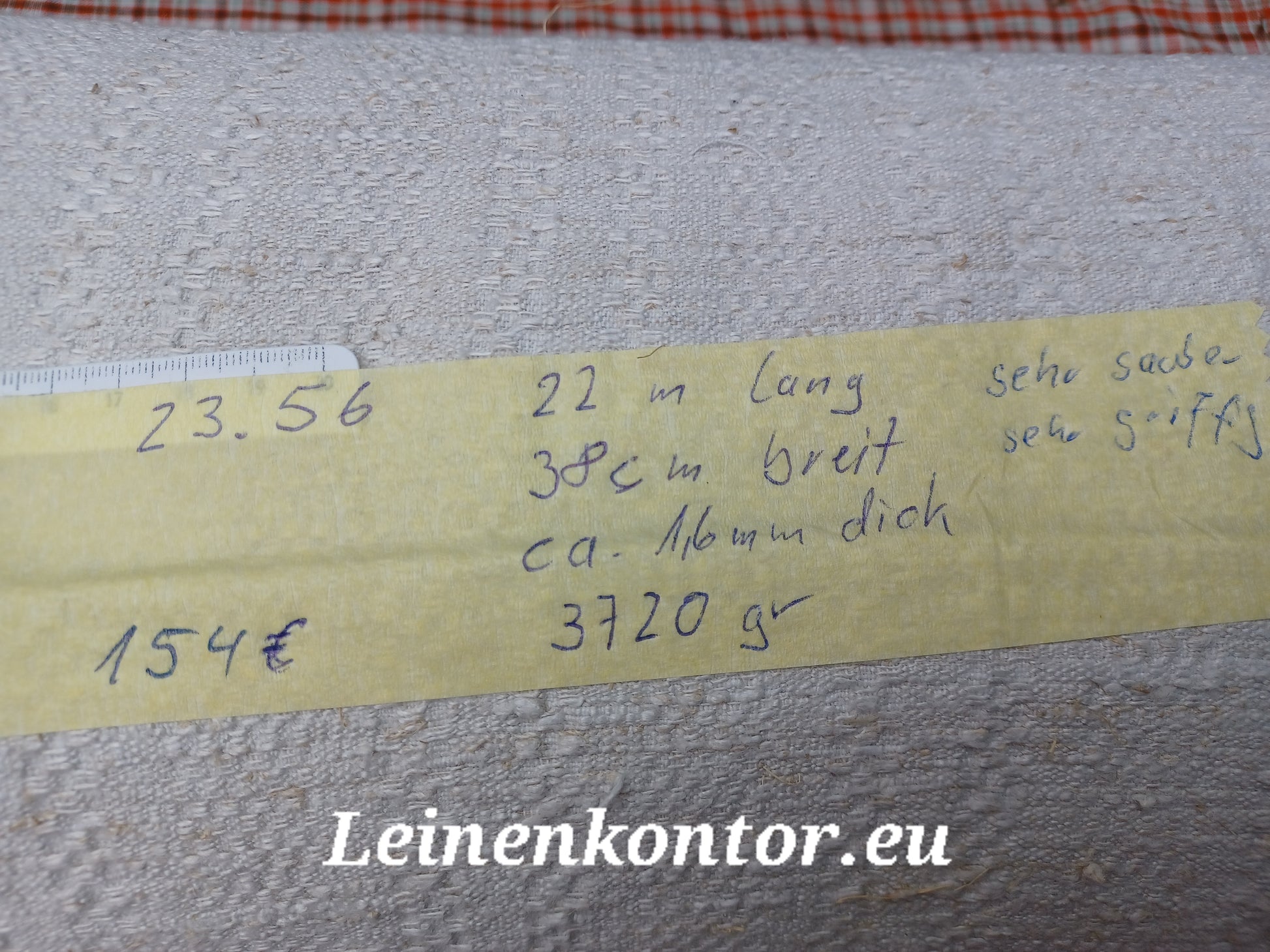 Leinenballen mit Etikett (Beschreibung)