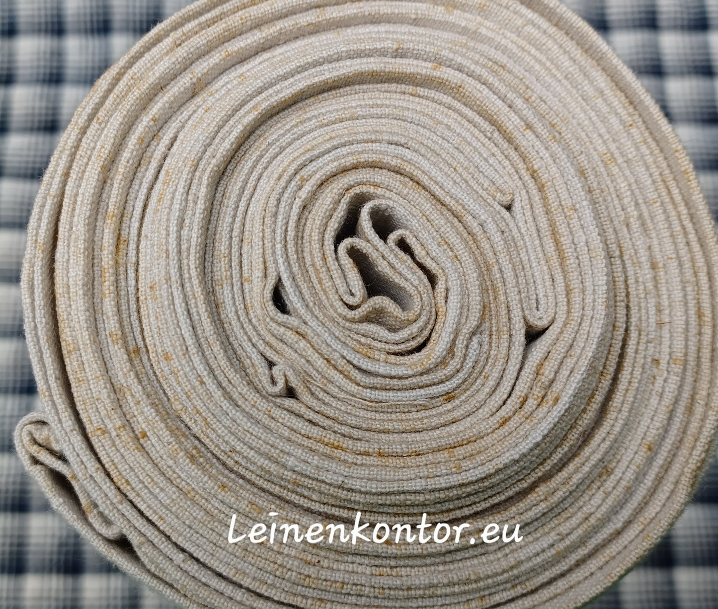 Leinenballen mit Ansicht auf gerollte Außenseite.