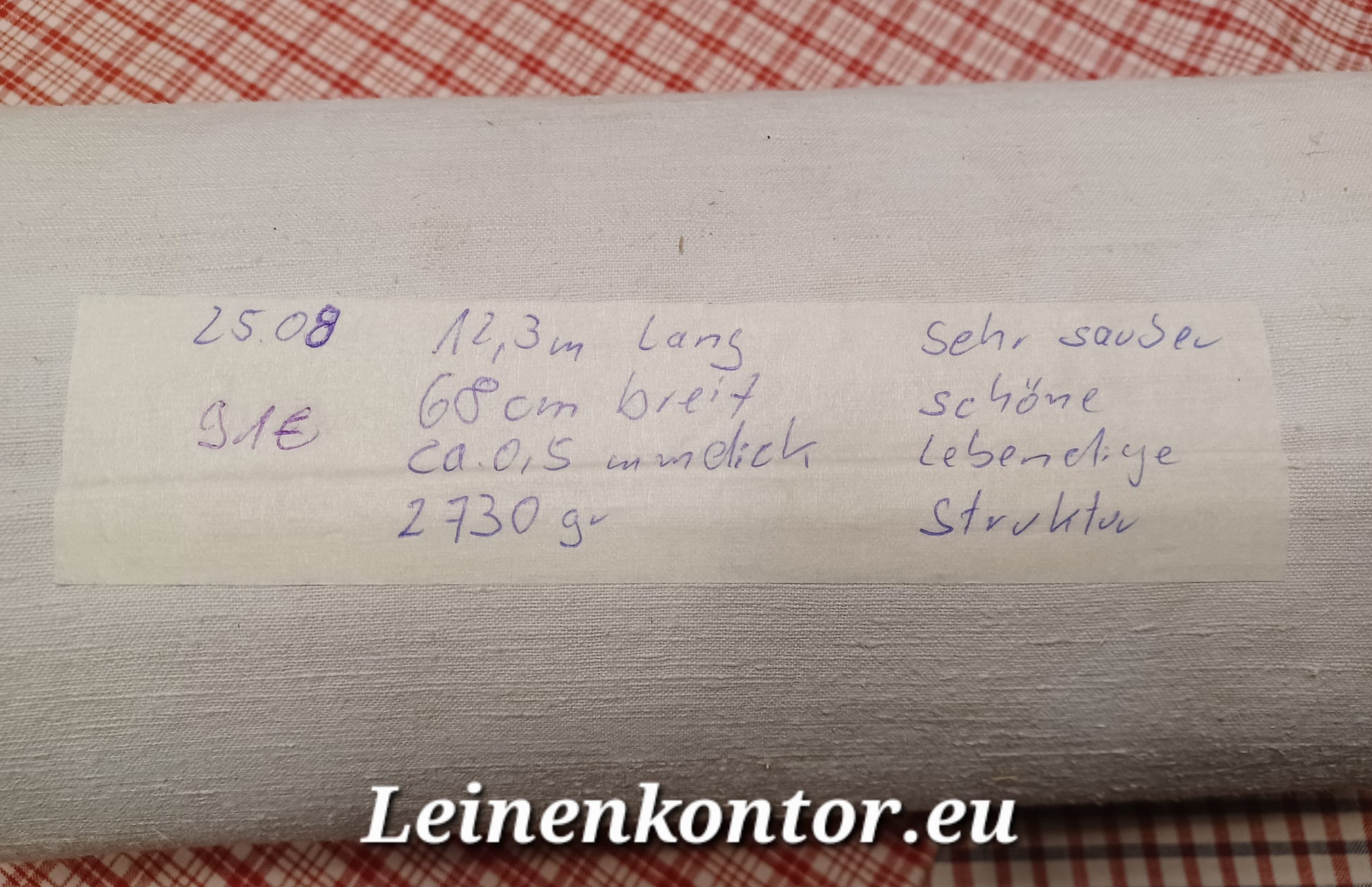 Leinenballen mit Etikett (Beschreibung)