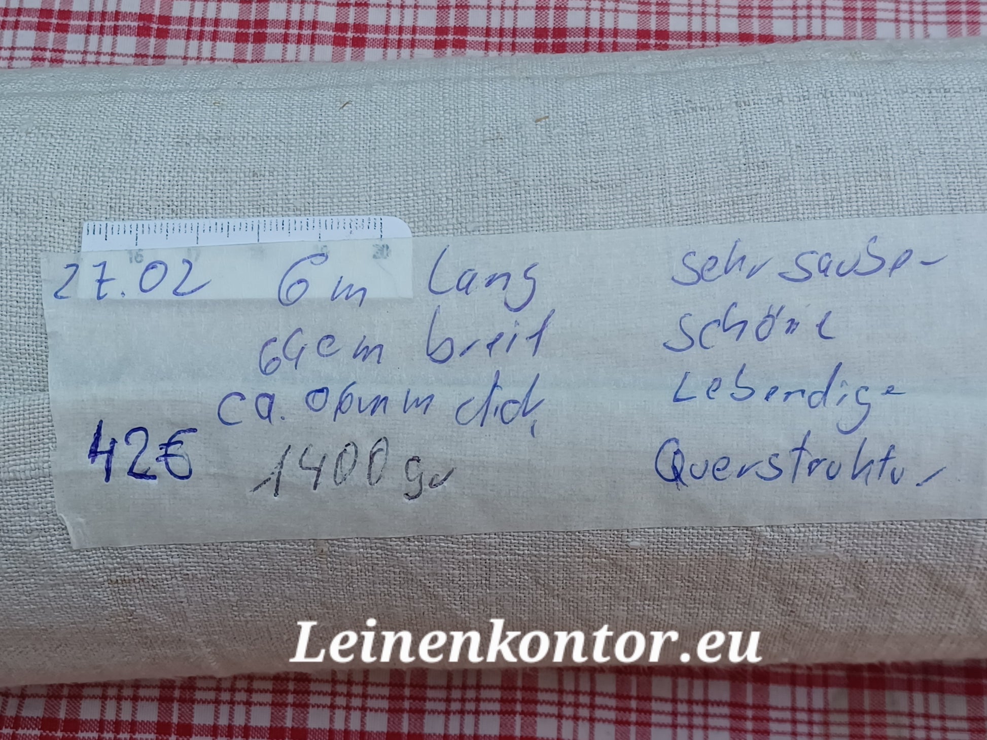 Leinenballen mit Etikett (Beschreibung)