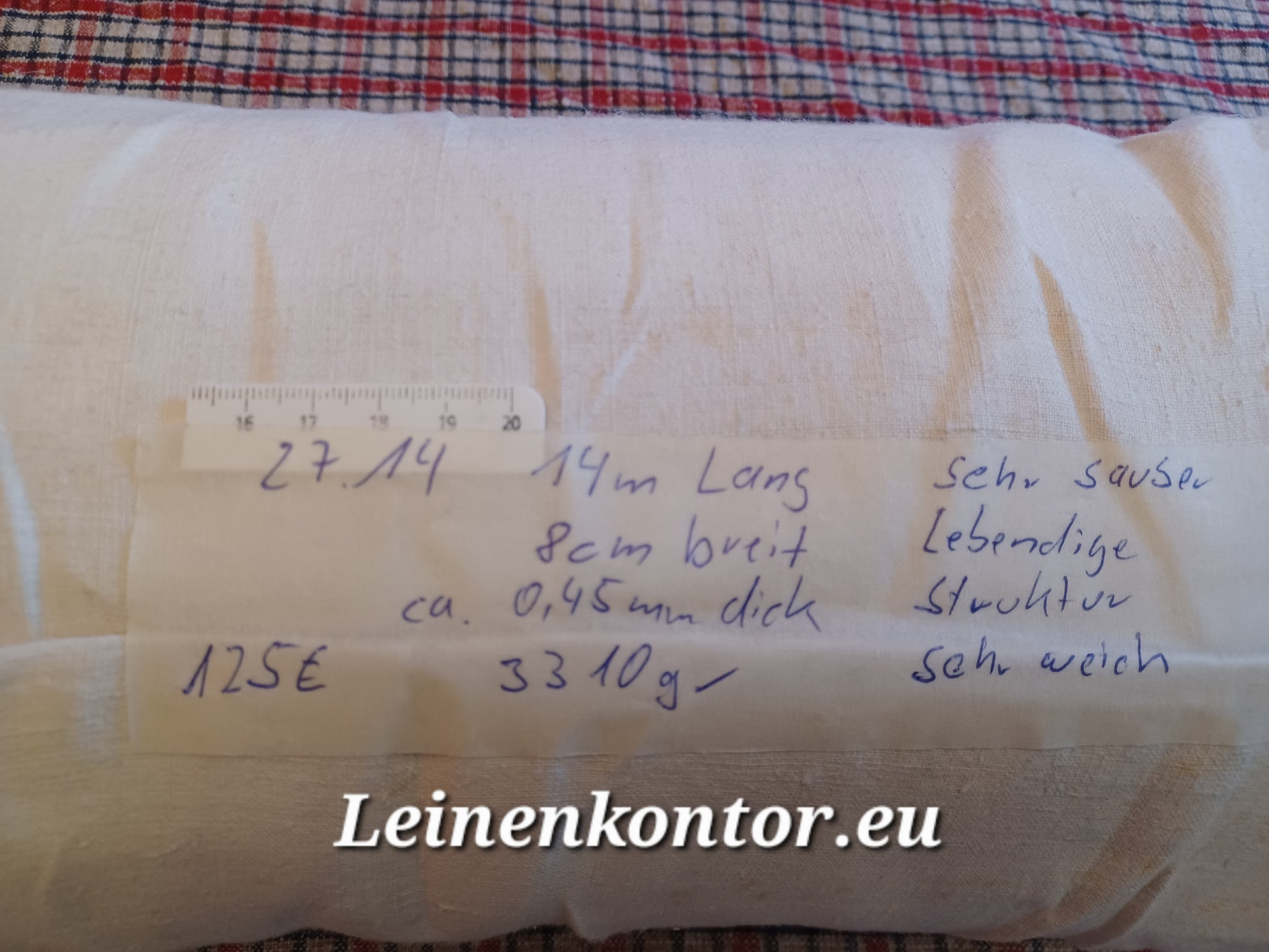 Leinenballen mit Etikett (Beschreibung)
