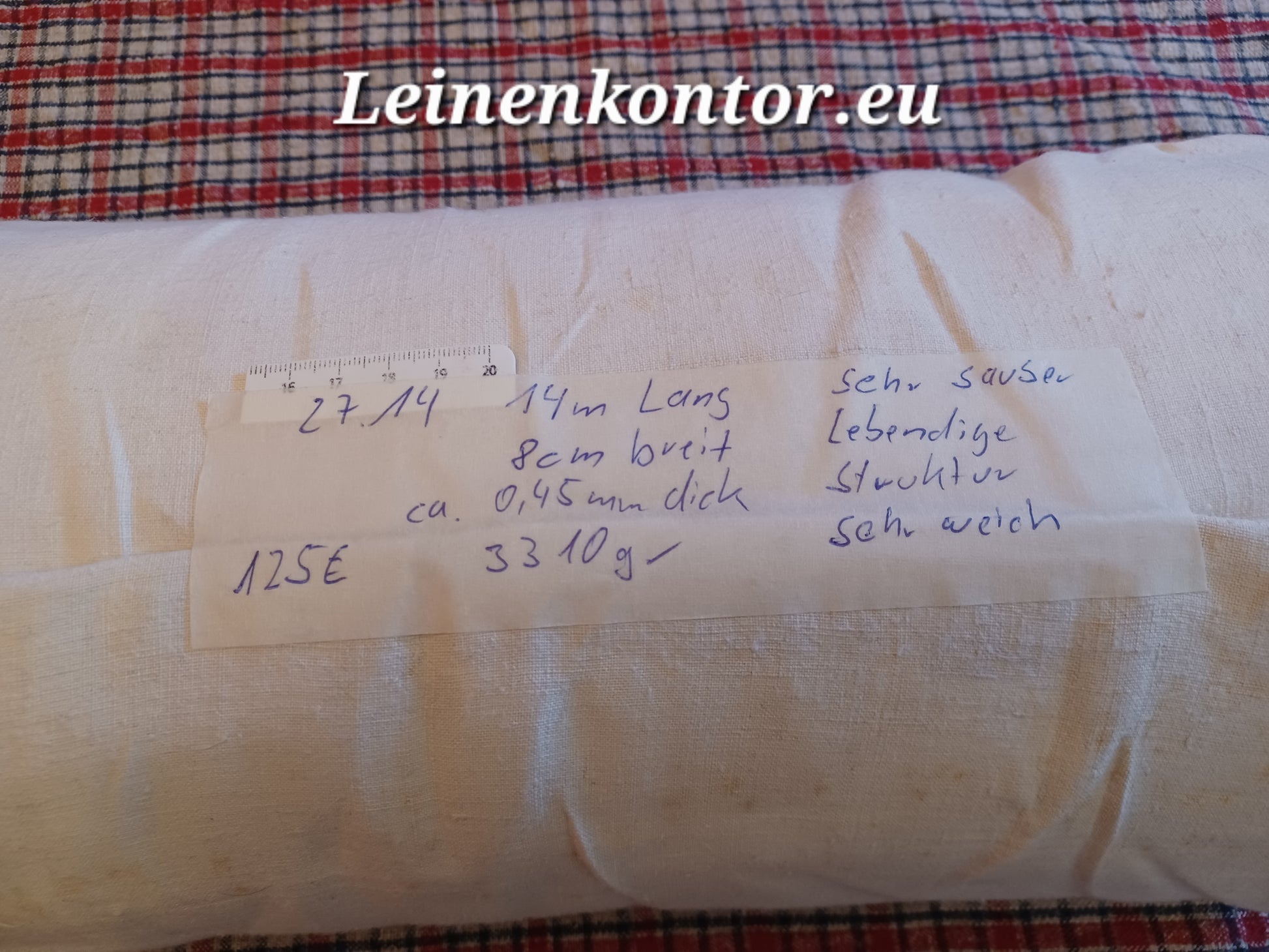 Leinenballen mit Etikett (Beschreibung)