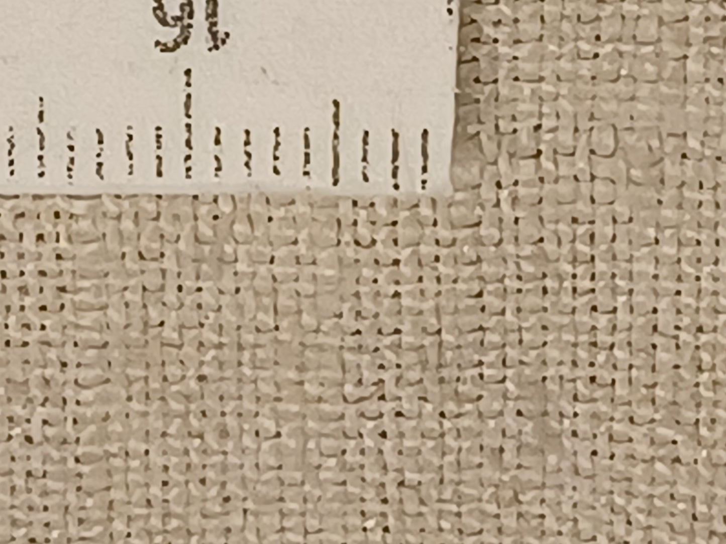 Leinenballen Textur feines helles Leinen mit Millimeterskala