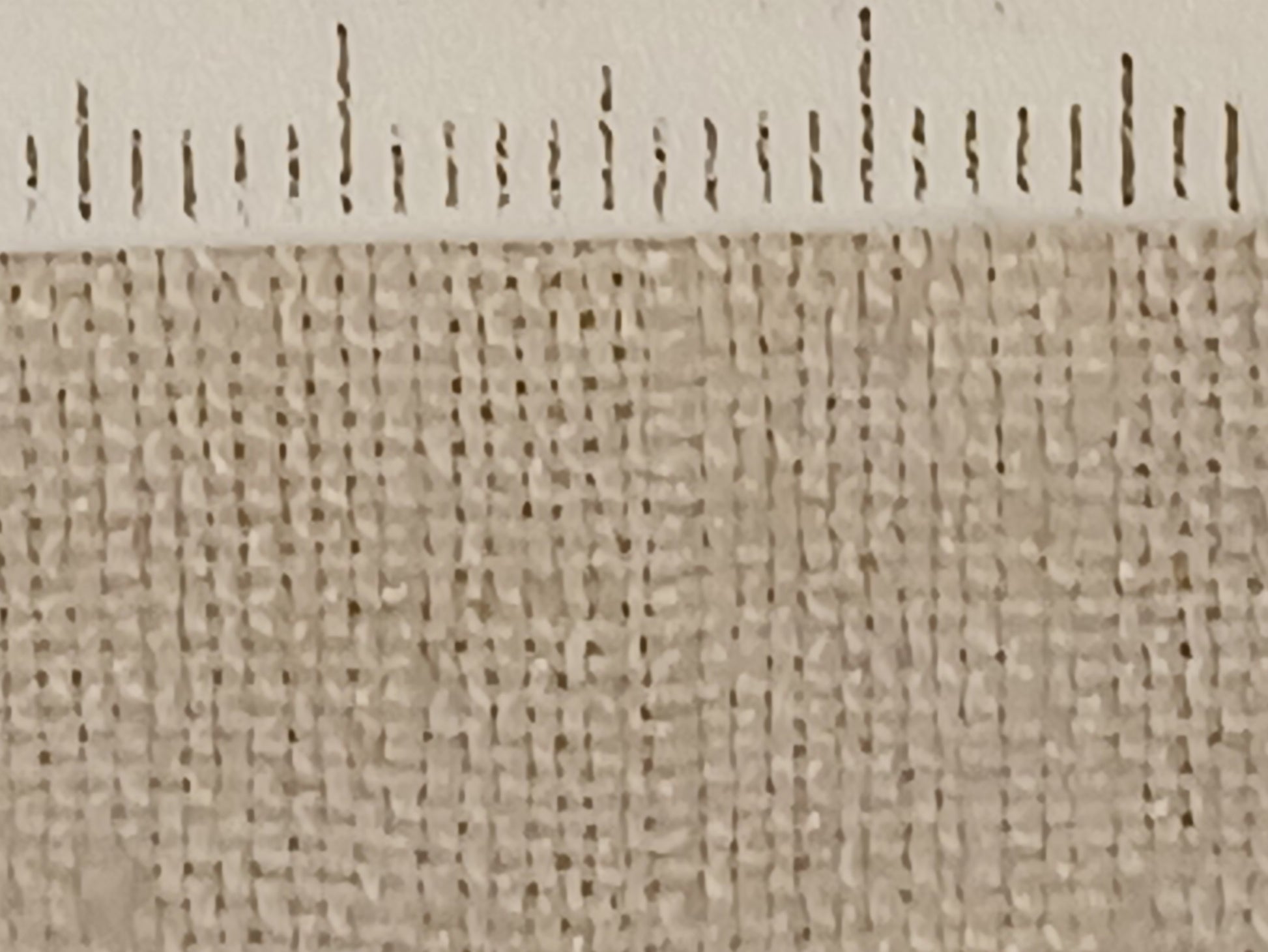 Leinenballen Textur feines helles Leinen mit Millimeterskala