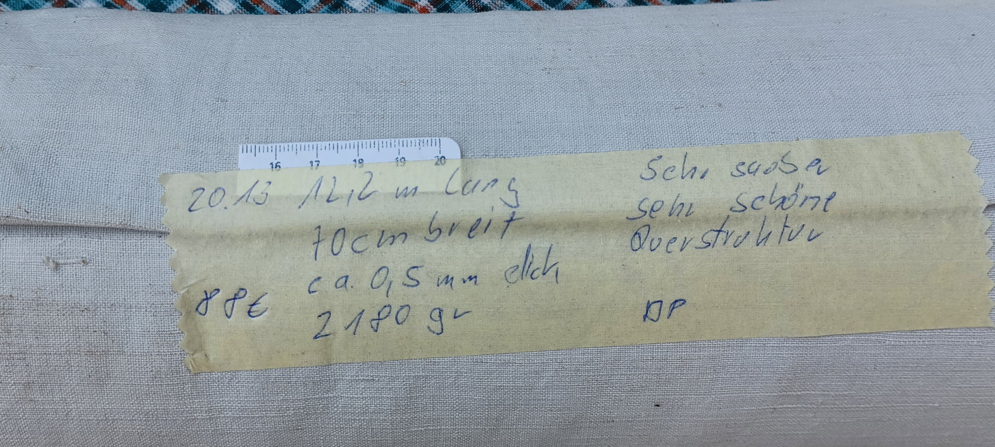 Leinenballen mit Etikett (Beschreibung)