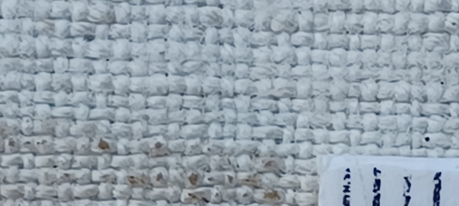 Leinenballen Textur mit Millimeterskala
