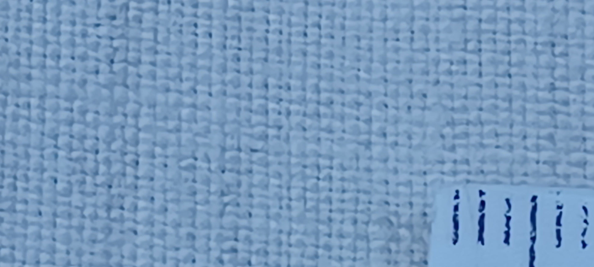 Leinenballen Textur Ansicht mit Millimeterskala