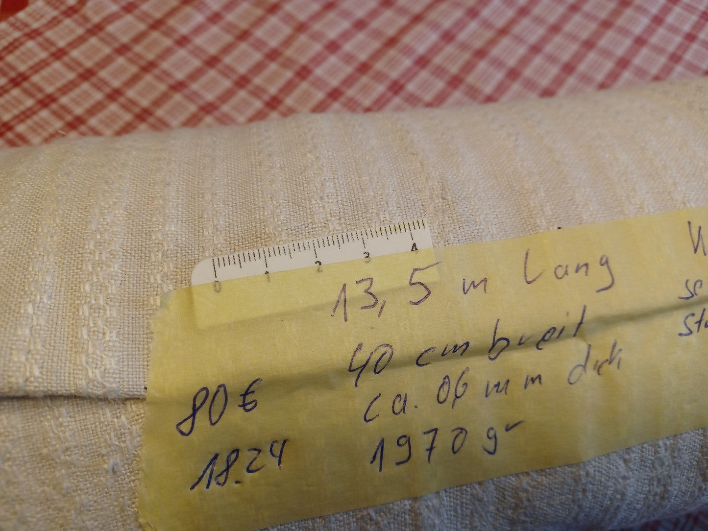 Leinenballen mit Etikett (Beschreibung)