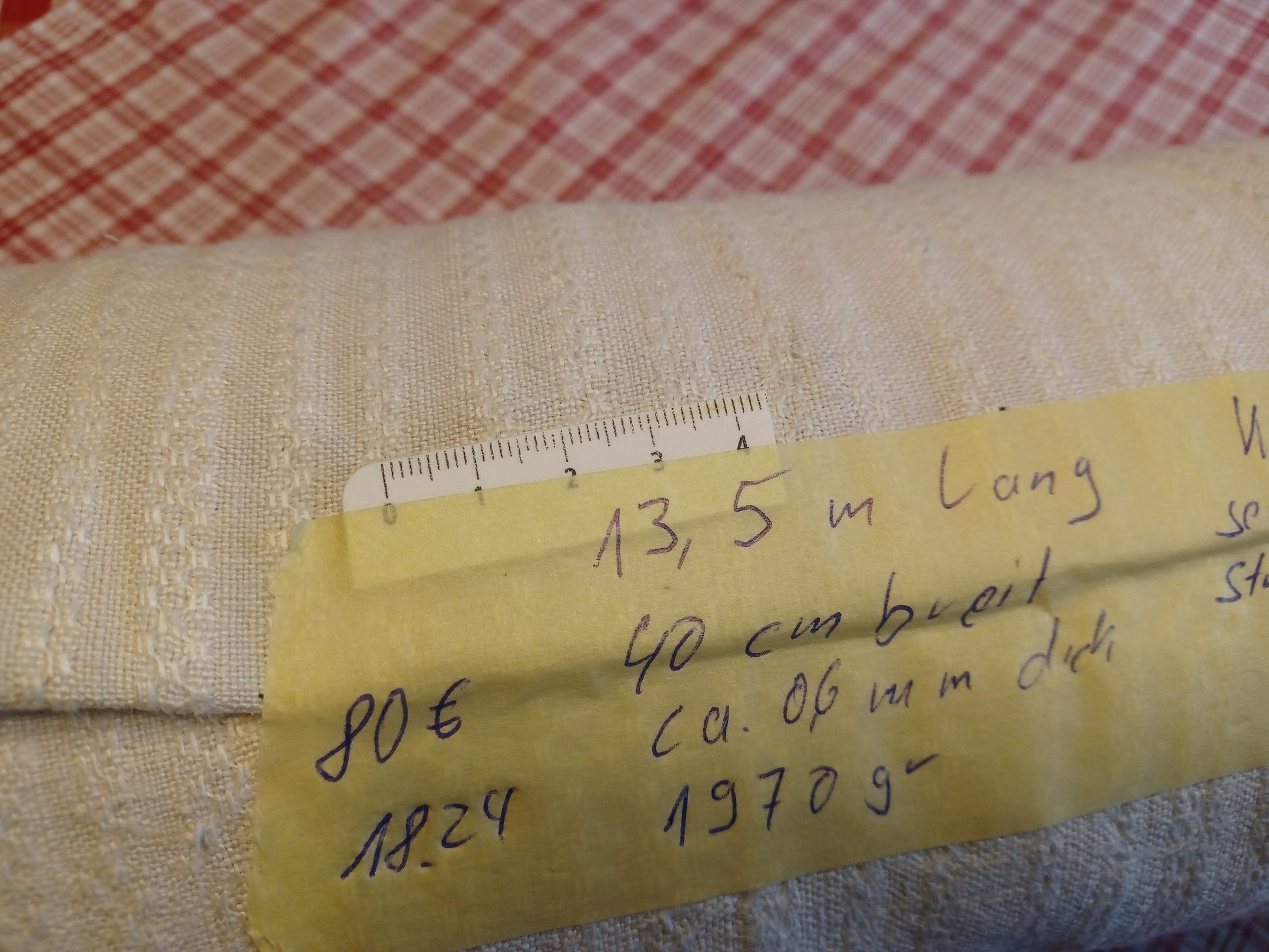 Leinenballen mit Etikett (Beschreibung)