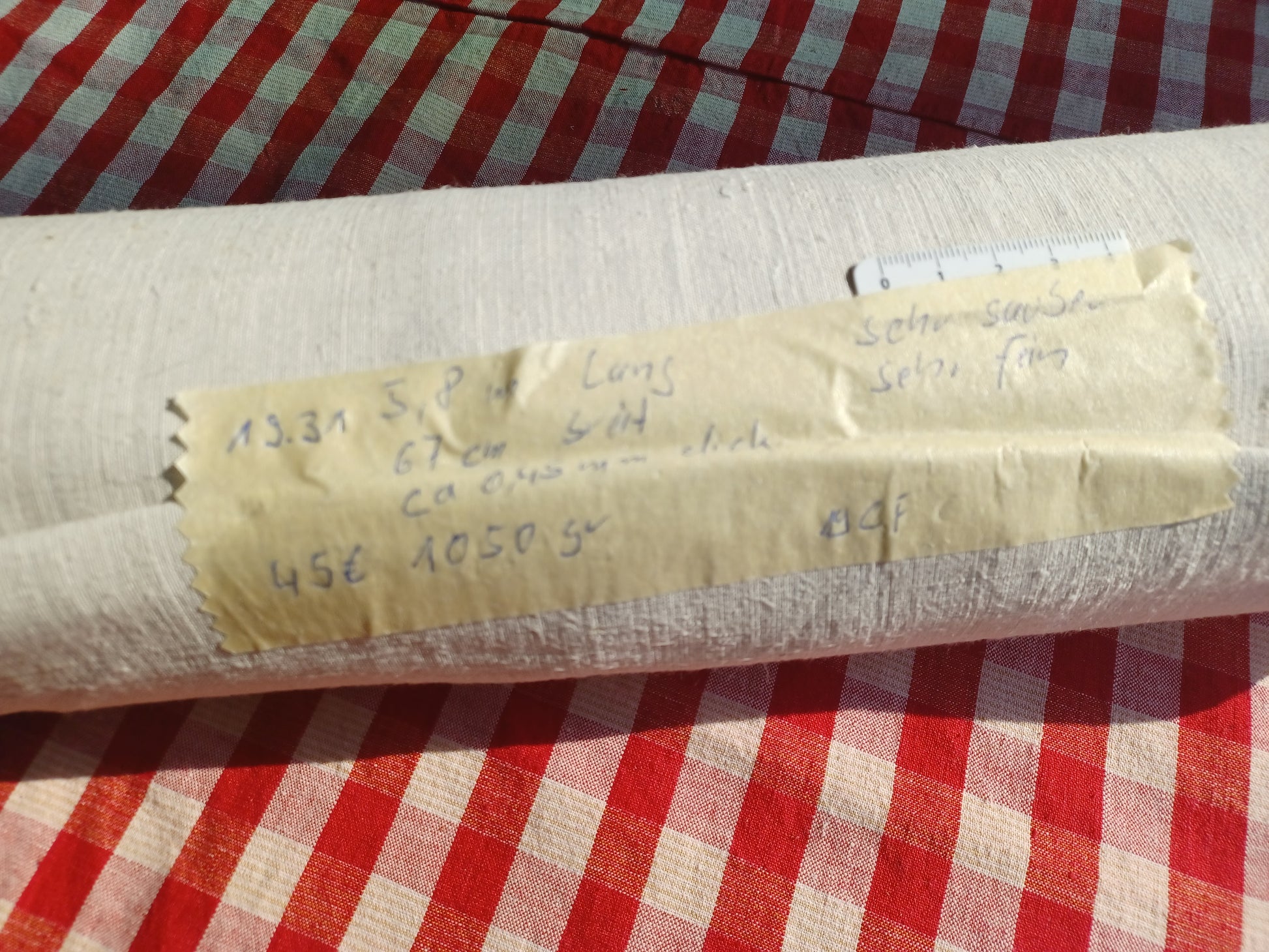 Halbleinenballen mit Etikett (Beschreibung)