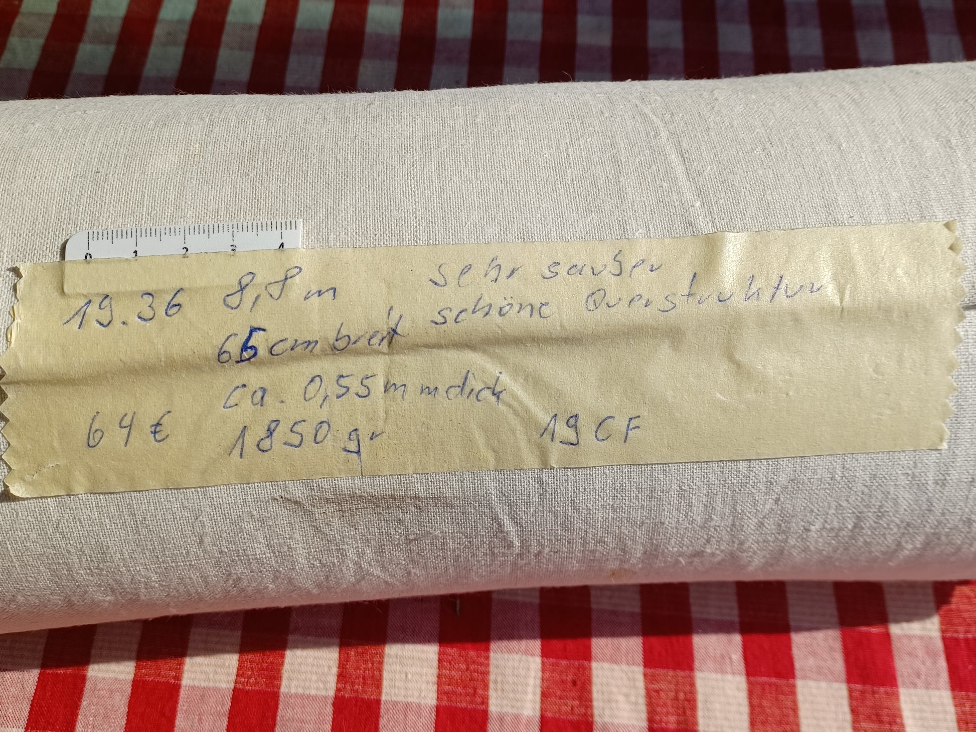 Leinenballen mit Etikett (Beschreibung)