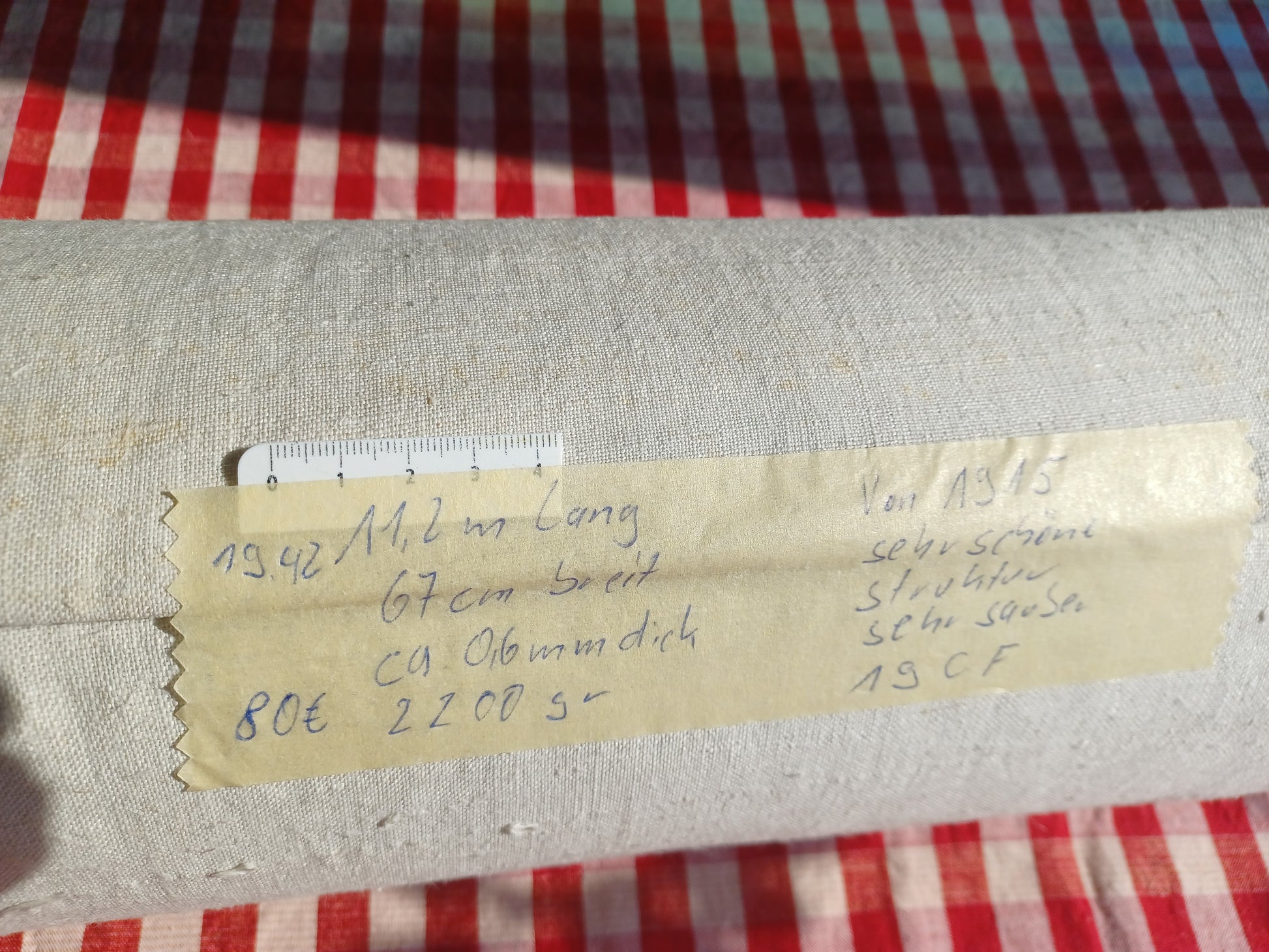 Leinenballen mit Etikett (Beschreibung)