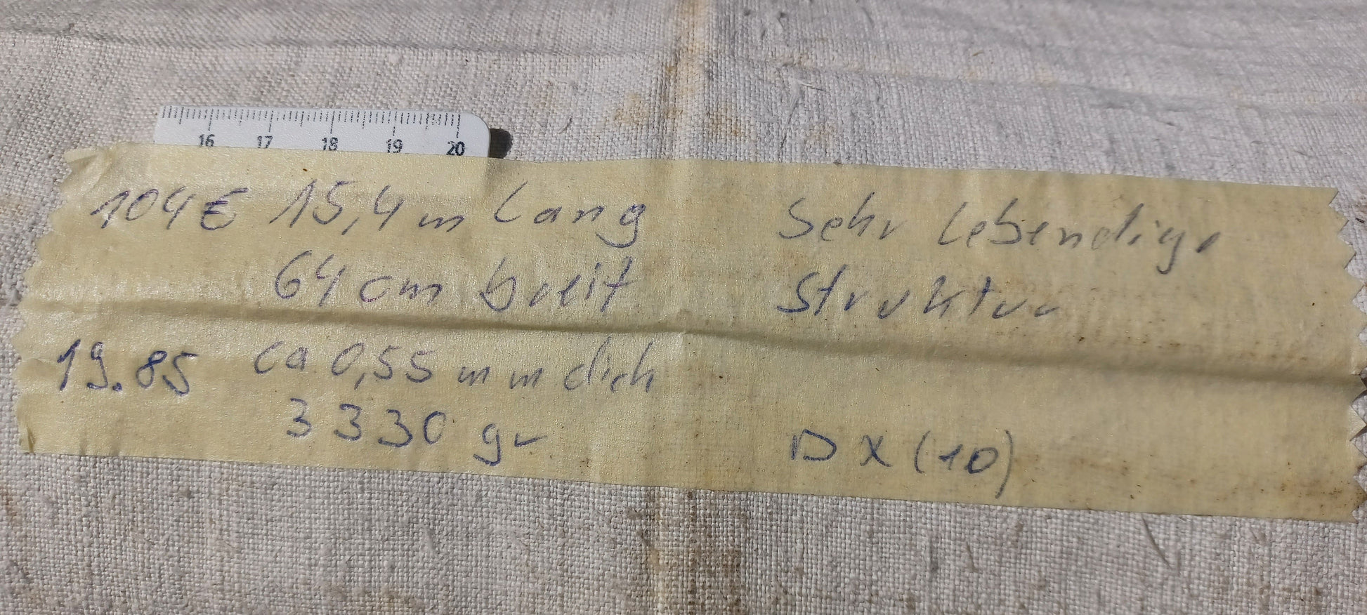 Leinenballen mit Etikett (Beschreibung)