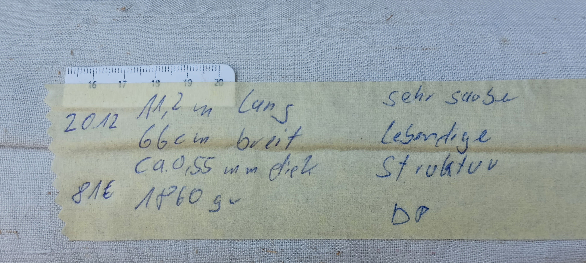 Leinenballen mit Etikett (Beschreibung)