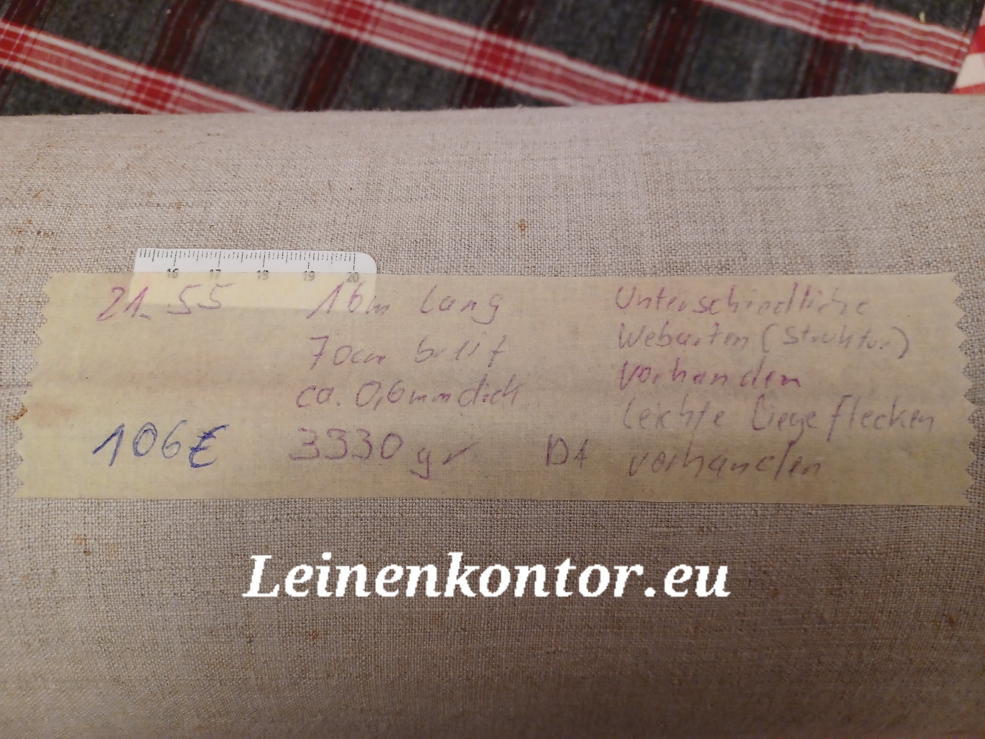 Leinenballen mit Etikett (Beschreibung)